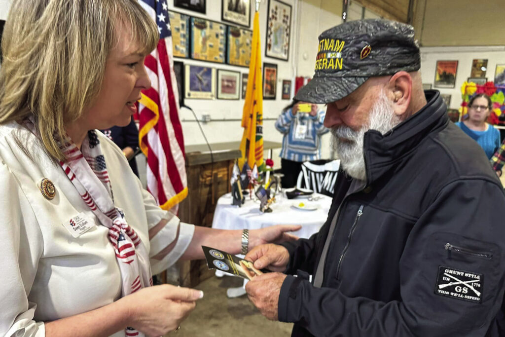 Faught reviews Vietnam War book at SAR meeting