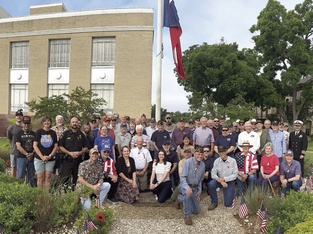 Left :Members of the VFW Post 7105 gathered at the Courthouse for the annual Memorial Day ceremony. – Photo by Tami King Right: Lt. Gen. Michael Oates (Ret.) speaks during the Memorial Day program at National Museum of the Pacific War honoring military service members who died in service to the United States.– Photo courtesy of National Museum of the Pacific War